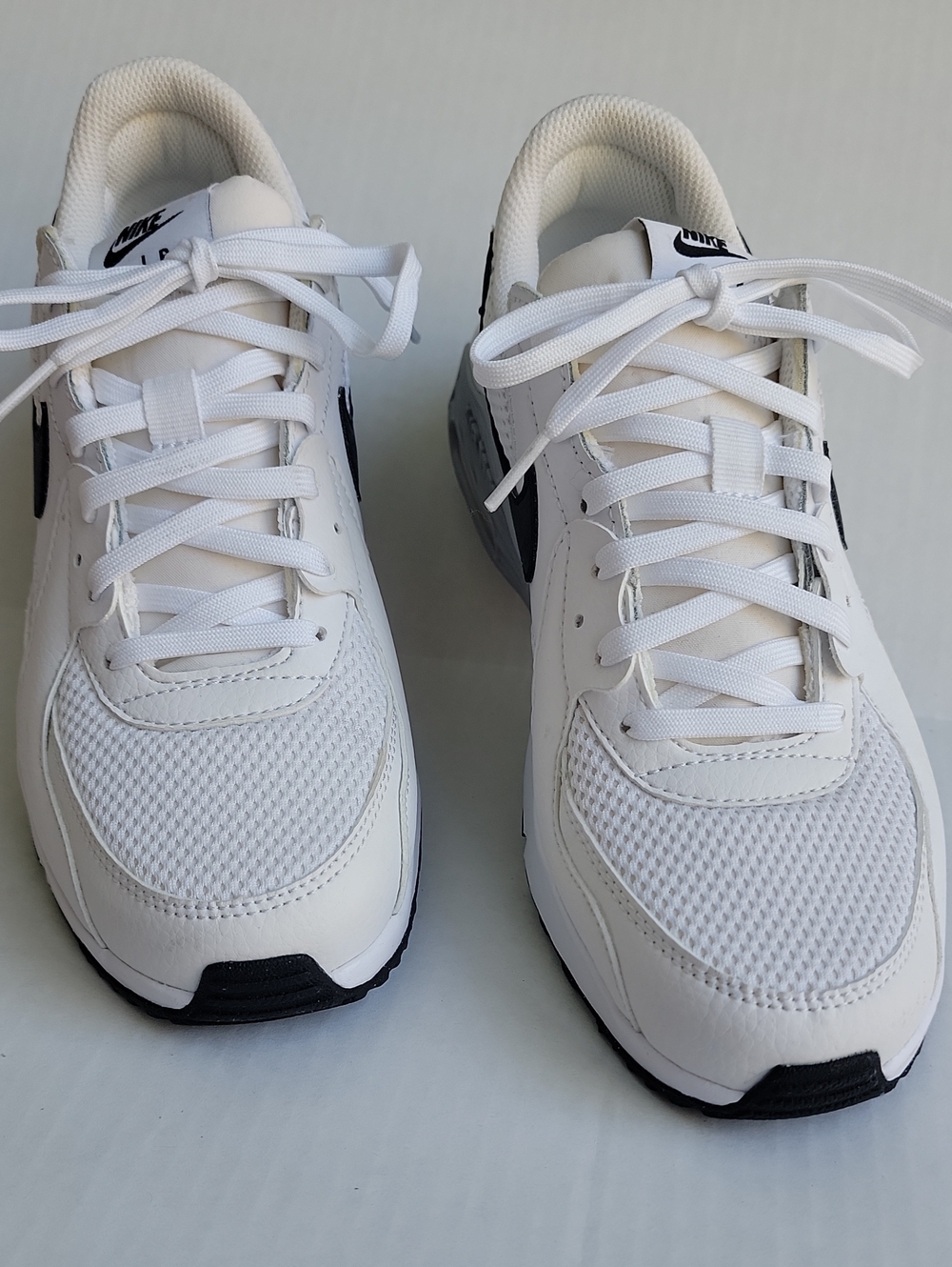 Nike Women’s White and Black Low-Top Sneakers with Mesh Upper